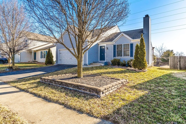 ranch-style house featuring fence, driveway, a chimney, a front lawn, and a garage