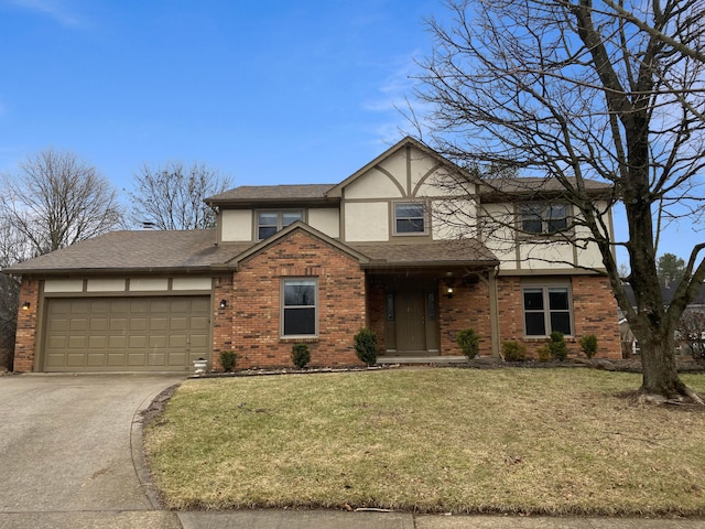 tudor-style house featuring an attached garage, stucco siding, a front lawn, concrete driveway, and brick siding