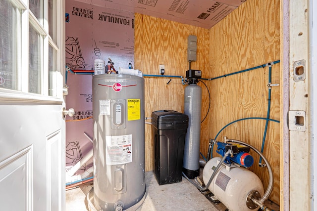 utility room with electric water heater