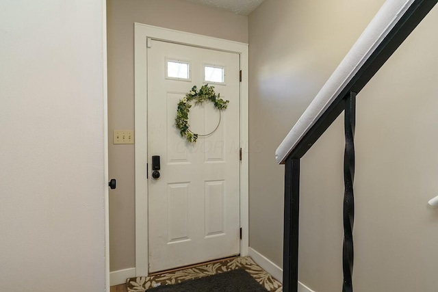 foyer with baseboards