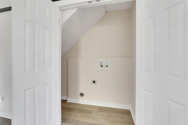 laundry room featuring laundry area, washer hookup, light wood finished floors, and electric dryer hookup