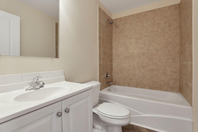 bathroom featuring shower / bathing tub combination, vanity, and toilet