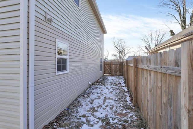 view of side of property featuring a fenced backyard