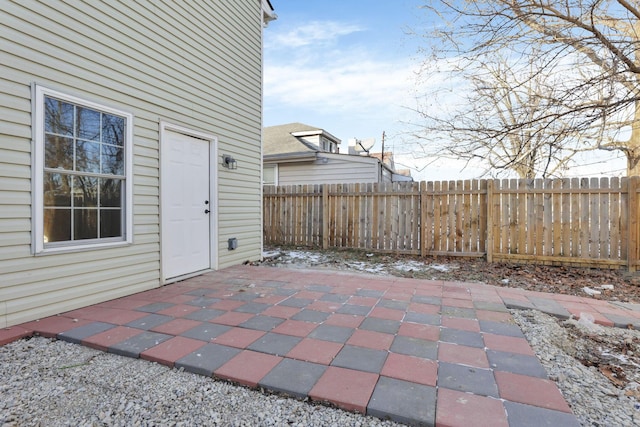 view of patio / terrace featuring fence