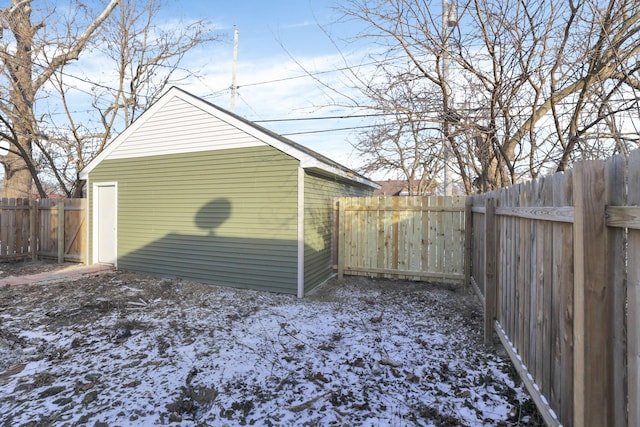 garage with fence