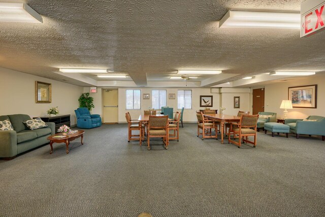 dining space with a textured ceiling