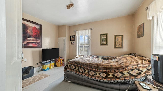 bedroom featuring wood finished floors