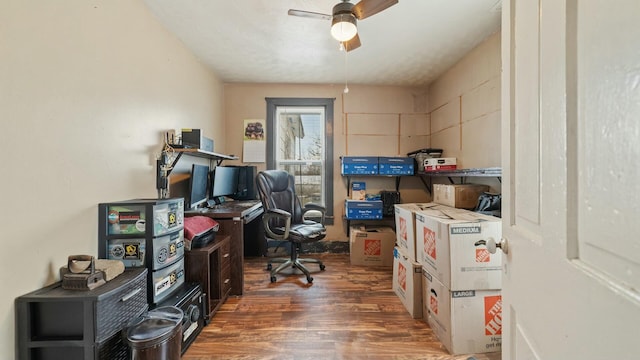 office space featuring a ceiling fan and wood finished floors