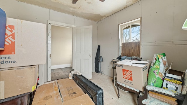 miscellaneous room with ceiling fan and wood finished floors