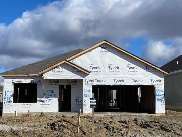 view of building exterior featuring an attached garage