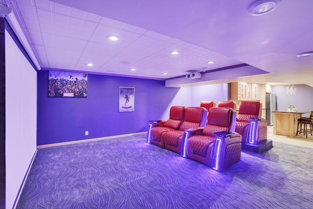 home theater with carpet, baseboards, and recessed lighting