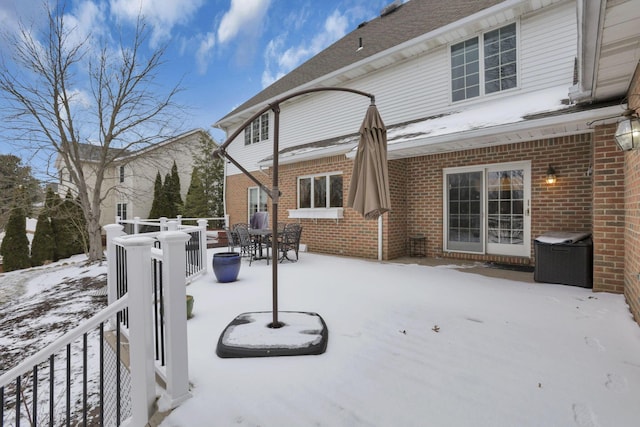 view of snow covered patio