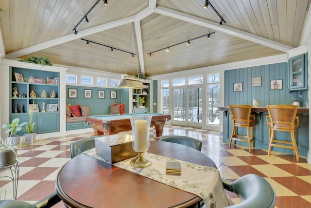 interior space featuring billiards, vaulted ceiling, and tile patterned floors