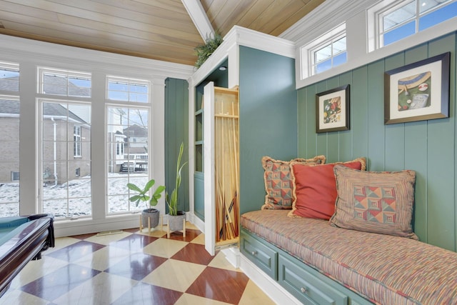 mudroom with wooden ceiling, tile patterned floors, and crown molding