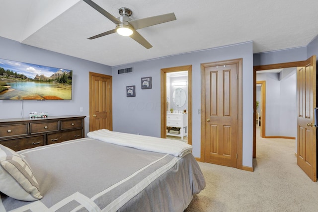 bedroom with baseboards, ceiling fan, visible vents, and light colored carpet