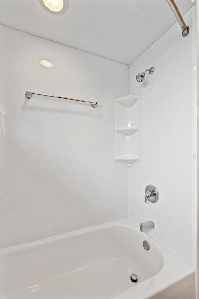 full bath featuring shower / bathing tub combination