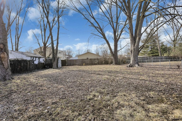 view of yard featuring fence