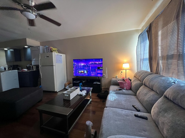 living room with a ceiling fan and wood finished floors