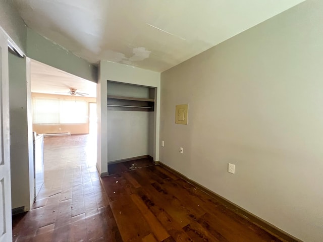 unfurnished bedroom featuring a closet and baseboards