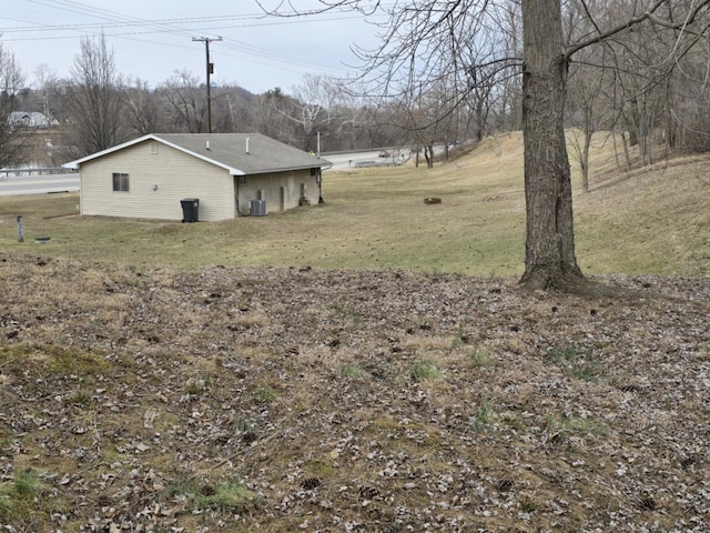 view of yard featuring central AC