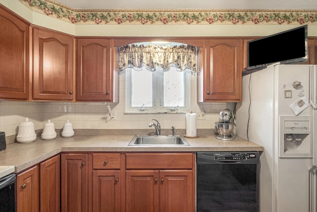 kitchen featuring a sink, light countertops, dishwasher, white fridge with ice dispenser, and tasteful backsplash