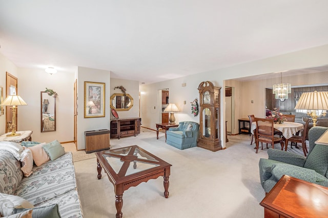 living area with light carpet and a notable chandelier