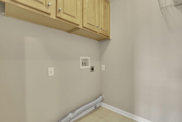 clothes washing area featuring hookup for a washing machine, light floors, baseboards, cabinet space, and electric dryer hookup