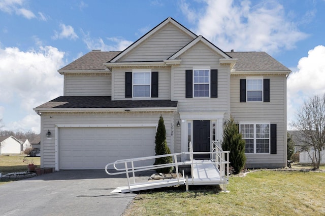 view of front of house with aphalt driveway, a front yard, a garage, and a shingled roof