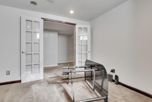 interior space featuring recessed lighting, baseboards, and carpet