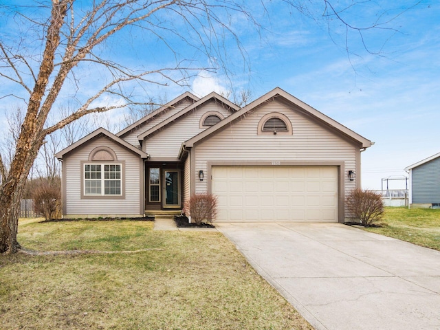 single story home with concrete driveway, an attached garage, and a front yard