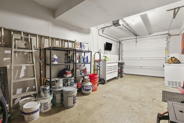 garage featuring a garage door opener