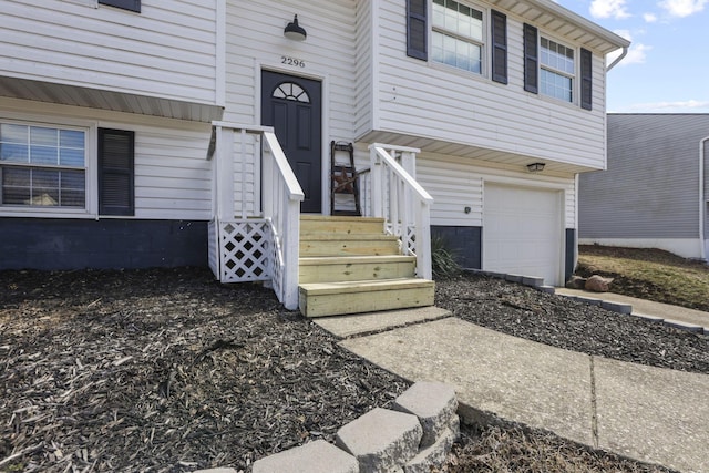 property entrance featuring a garage