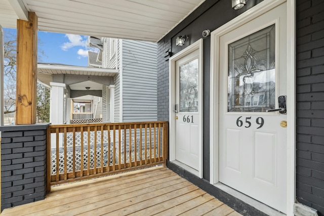 entrance to property with a porch