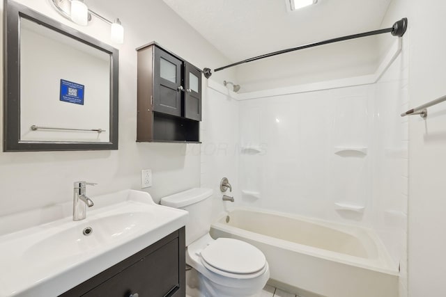 bathroom with  shower combination, vanity, and toilet