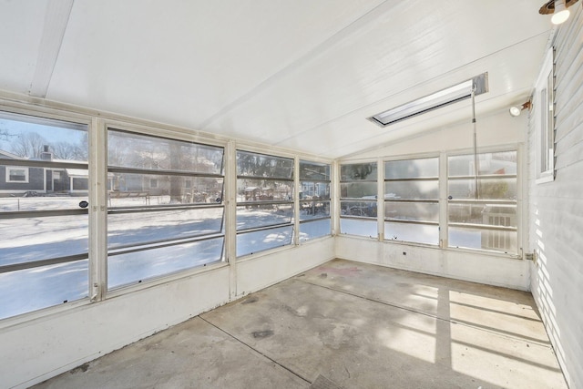 unfurnished sunroom with lofted ceiling