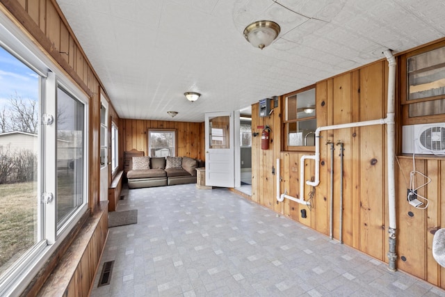 interior space featuring ac unit and visible vents