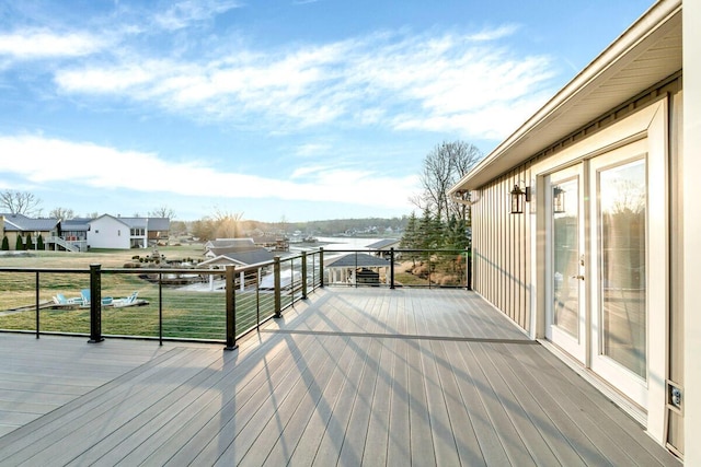 wooden deck with a residential view