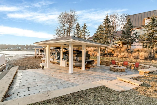 view of patio featuring a fire pit