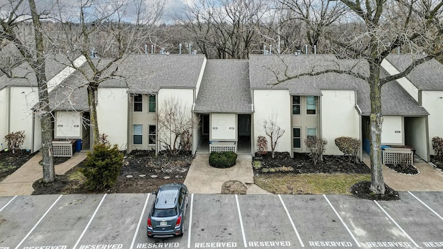 exterior space featuring uncovered parking