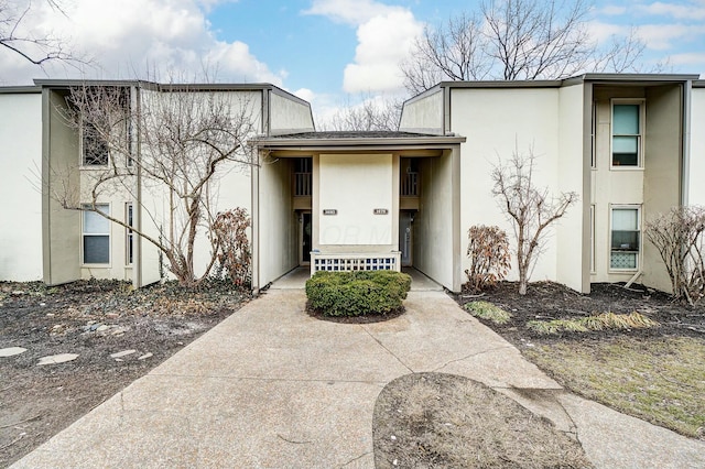 exterior space featuring stucco siding