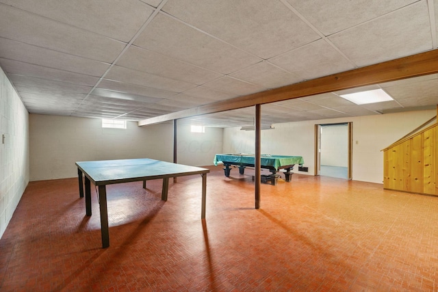 playroom featuring concrete block wall and billiards