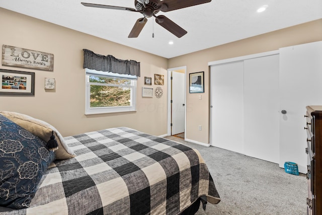 bedroom featuring recessed lighting, a closet, carpet flooring, and ceiling fan