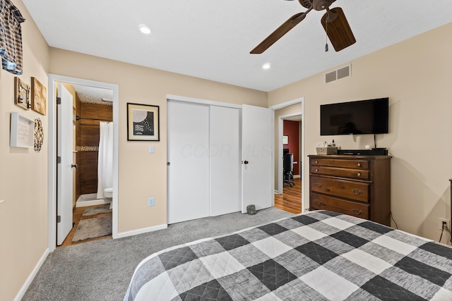 bedroom with recessed lighting, a closet, visible vents, carpet flooring, and baseboards