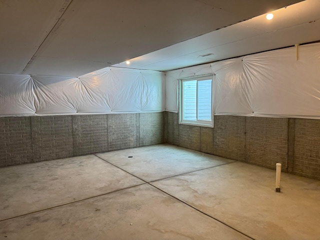 bonus room with concrete floors