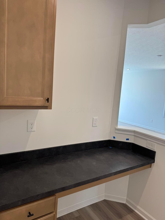 room details with wood finished floors and baseboards