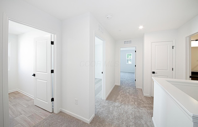 603 Mill Stone Dr Lot 2257, Sunbury, OH 43074 - corridor featuring baseboards, recessed lighting, and light carpet