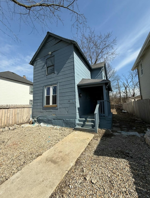 view of front facade with fence