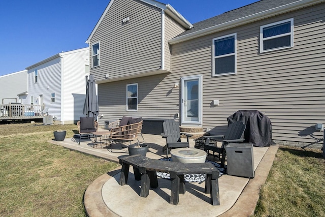 back of house featuring a patio, central AC unit, and a lawn