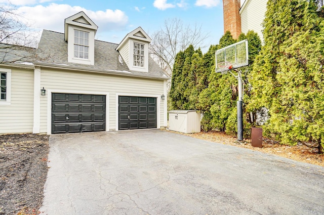 view of property exterior with driveway and roof with shingles