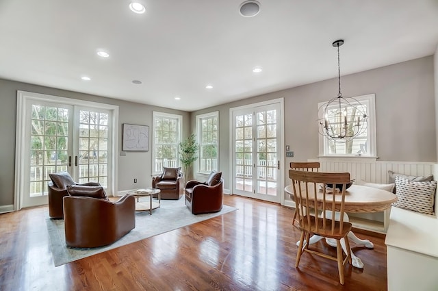 interior space featuring french doors, wood finished floors, and recessed lighting